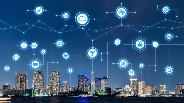 Smart maintenance 2025 concept with IoT and AI network over modern industrial city – Taiyo Holding